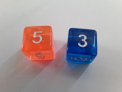 Orange transparent with white numbers six sided dice
